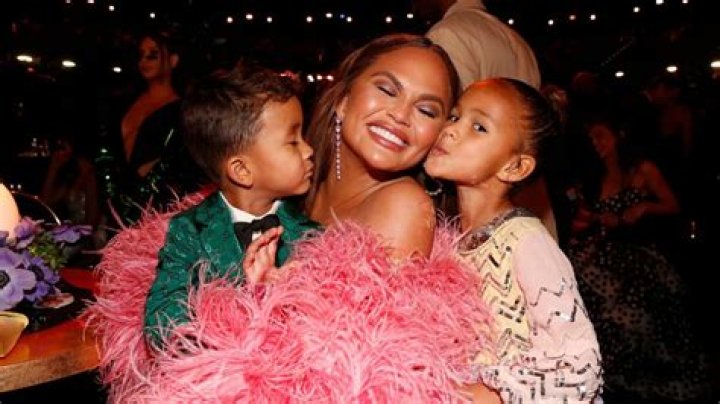 
Pregnant Chrissy Teigen Shares Sweet Photo of Daughter Luna, 6, Kissing Her Baby Bump 