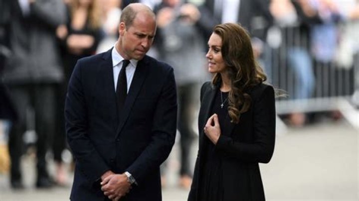 
Prince William, Kate Middleton View Memorial Flowers In First Solo Outing As Prince And Princess Of Wales 