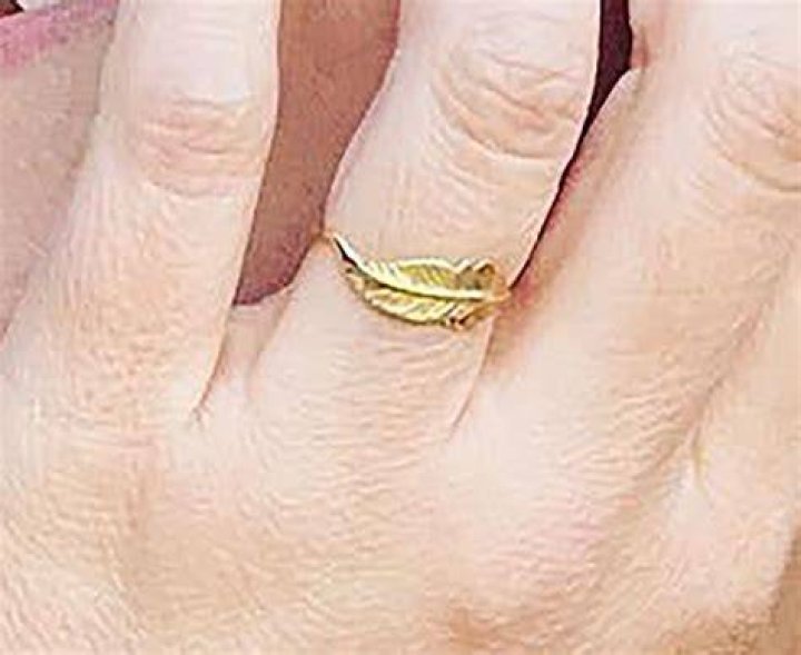 
Sara Bareilles Shows Off Her Unique Gold Feather Band Engagement Ring from Fiancé Joe Tippett 
