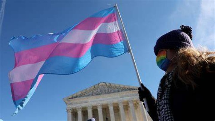 
Who is Kayla Denker? Extremist transgender activist poses with assault rifle 